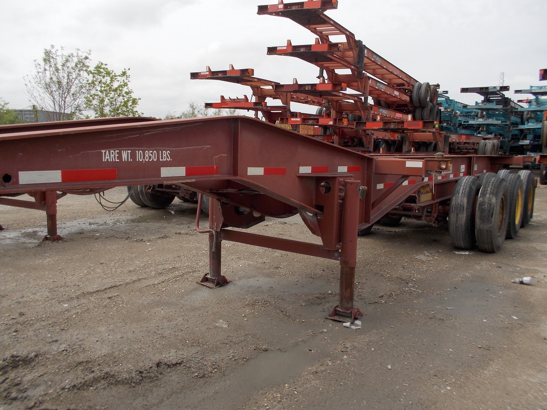 330038 used 3ax container chassis (3) lr Innova Industries.